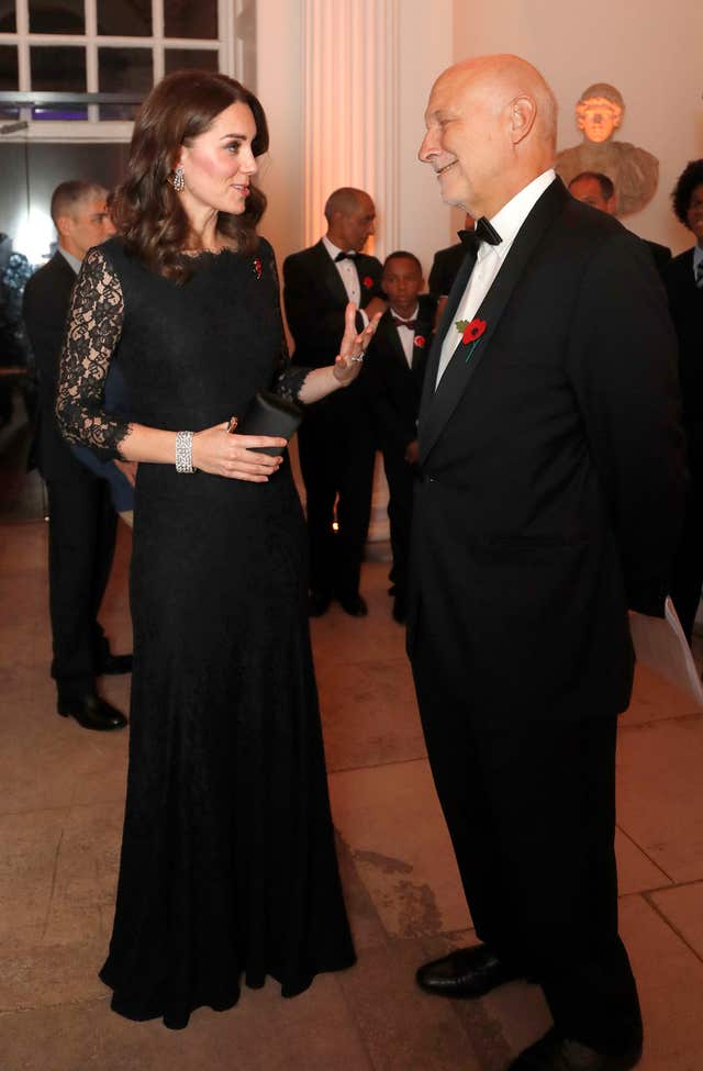 The Duchess of Cambridge speaks to Peter Fonagy, CEO of the Anna Freud National Centre for Children and Families during the gala dinner at Kensington Palace (Frank Augstein/PA)