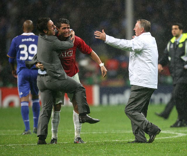 Sir Alex Ferguson celebrates his second Champions League success with Cristiano Ronaldo and Gary Neville