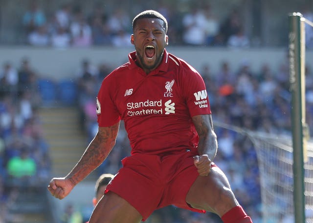 Georginio Wijnaldum celebrates scoring the opening goal