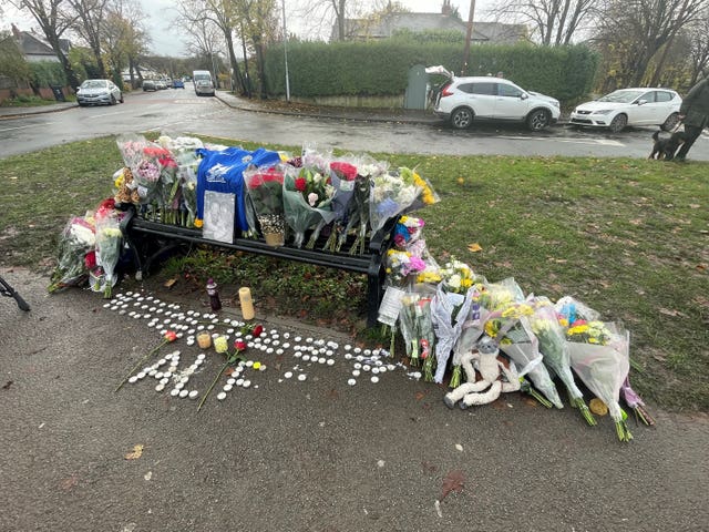 Tributes left on a bench on Broadgate Lane, Horsforth, following the death of Alfie Lewis in November