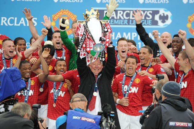 Sir Alex Ferguson lifts the Premier League trophy