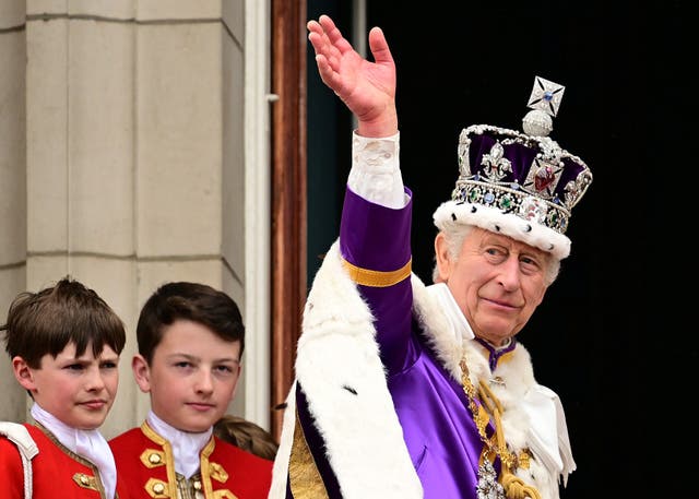 The King wearing the Imperial State Crown on his coronation day