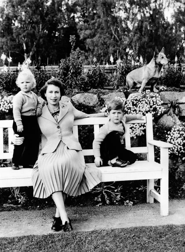 The Queen and a young Charles and Anne