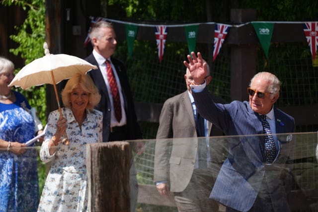 King Charles III and Queen Camilla arrive for a visit to Penguin Beach to celebrate the 200th anniversary of Zoological Society of London, at London Zoo