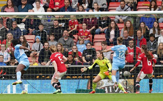 Khadija Shaw (left) heads in the first goal