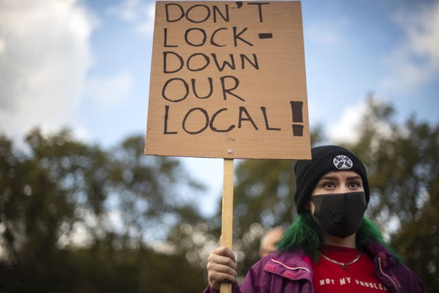 Workers from the live entertainment sector join a silent protest in Parliament Square, London, calling for immediate support from the Government for the jobs in the events, arts and cultural industry that are at risk of being lost whilst the sector is unable to operate under coronavirus restrictions