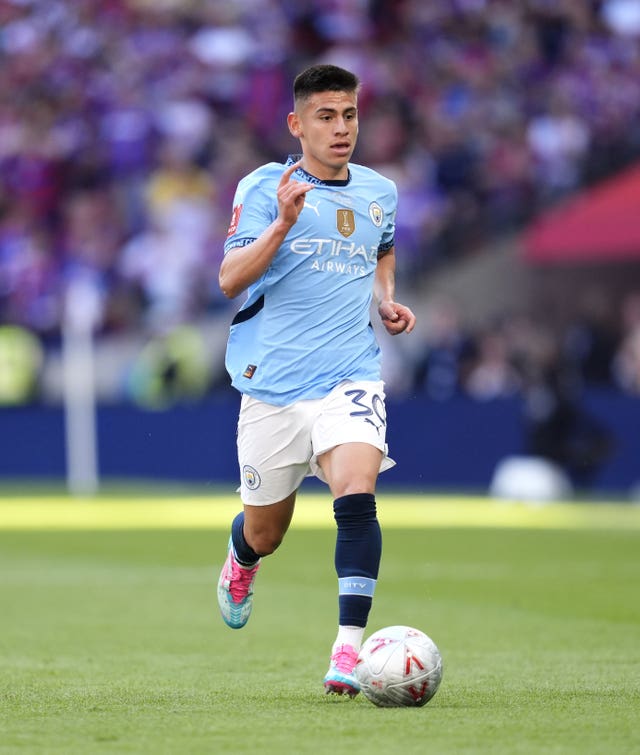 Manchester City’s Claudio Echeverri runs with the ball