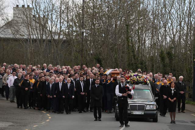 The funeral cortege makes it way to Saint Patrick’s Church (Brian Lawless/PA)