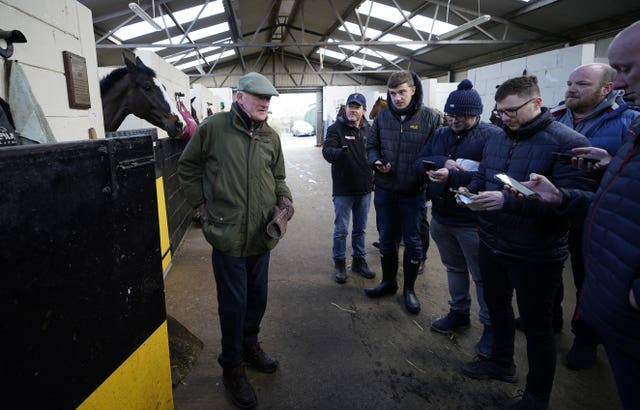 Willie Mullins speaking to the media during the visit to his yard