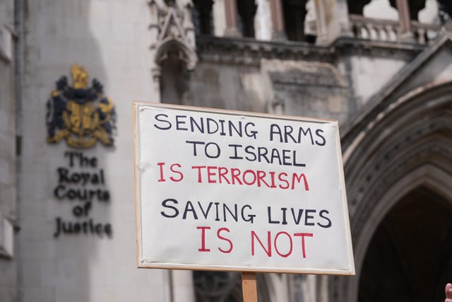 A placard outside the Royal Courts of Justice in central London after the Court of Appeal ruled that the decision to ban Palestine Action as a terror group was lawful