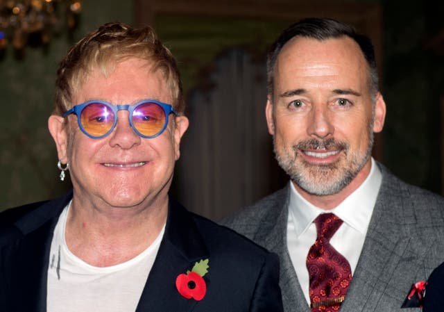 Sir Elton John and David Furnish at Winfield House in London (Hannah McKay/PA)