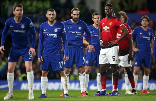 United into quarter-finals to increase pressure on Sarri