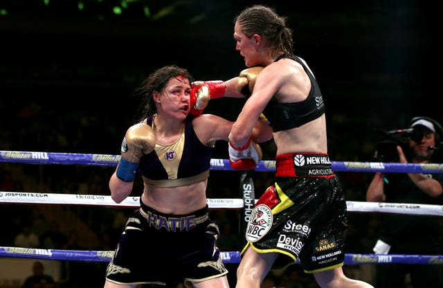 Delfine Persoon, right, lands a punch against Katie Taylor