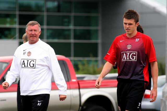 Sir Alex Ferguson and Michael Carrick