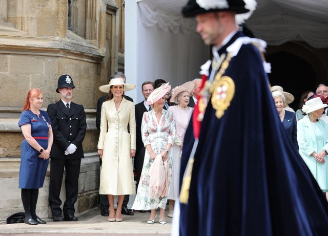 The Princess of Wales with the Duchess of Edinburgh as the Prince of Wales walks past during the Order of the Garter procession