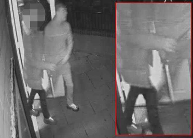 CCTV of the 15-year-old offender handing Joe Ward the weapon in the doorway of the Royal British Legion