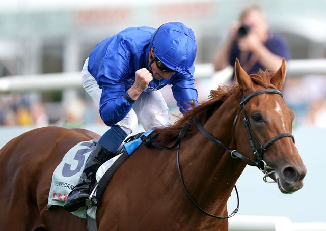William Buick celebrates winning the St Leger with Hurricane Lane