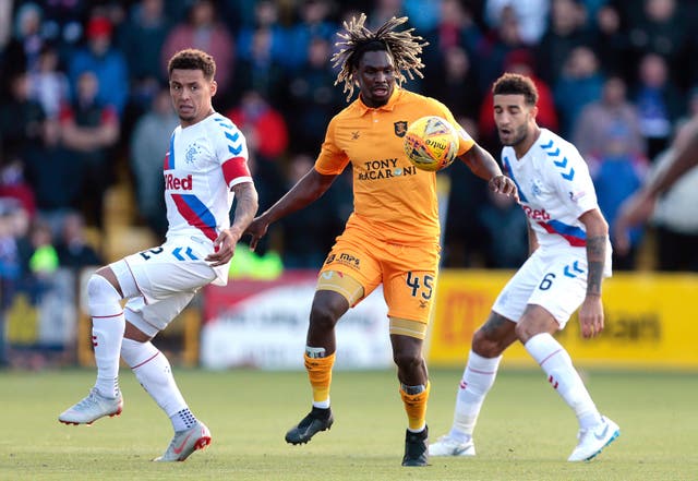 Livingston's Dolly Menga, centre, during the game against Rangers