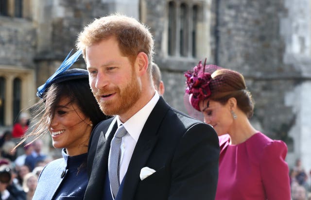 Prince Harry, Meghan Markle and Kate Middleton arrive at the wedding of Princess Eugenie (PA)