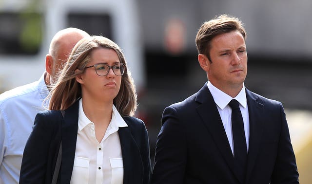 Liam Rosney, left, arriving at Mold Crown Court with his wife Victoria Rosney