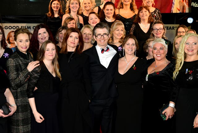 Kristin Scott Thomas, Gareth Malone and Sharon Horgan with the Combined MILitary Wives Choir at the 2020 Military Wives Movie Premiere 