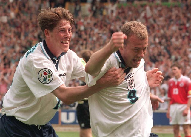 Darren Anderton, left, celebrates a goal with Alan Shearer