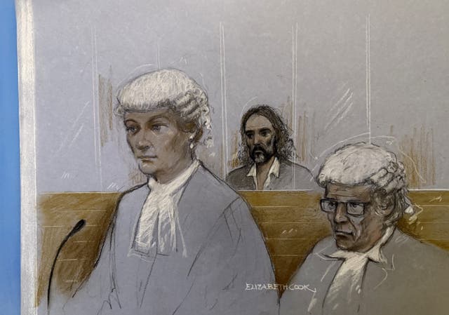 A sketch of Russell Brand listening to evidence