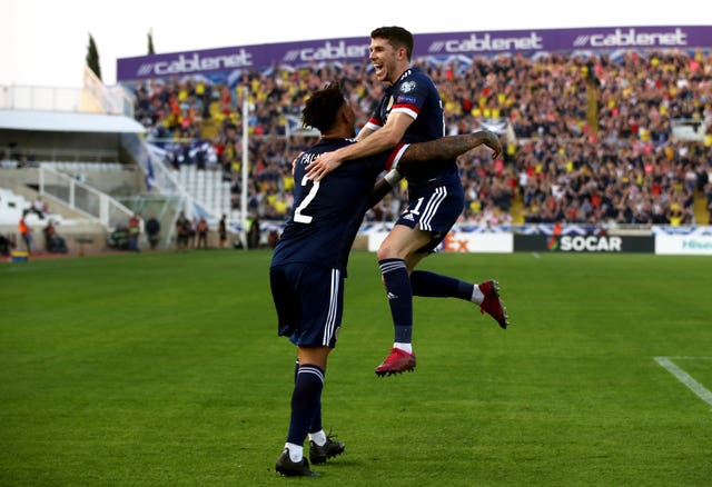 Liam Palmer and Ryan Christie celebrate winning in Cyprus