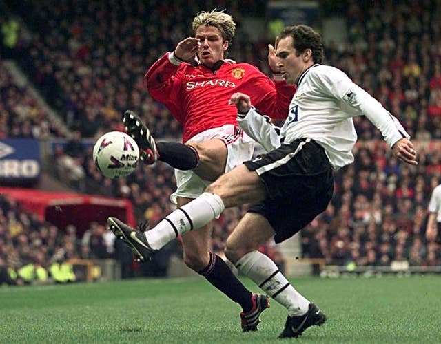 Dorigo (right) played for Derby in the twilight of his career, coming up against the likes of England captain David Beckham.