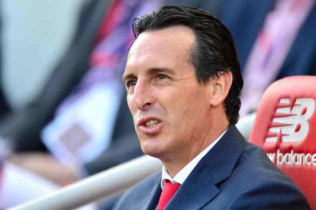 Emery says the decision to drop Ozil was made collectively by the club