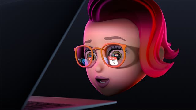 A bitmoji looking at a Macbook screen