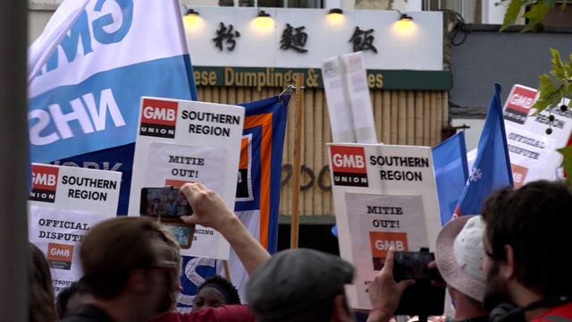 Hospital workers from St George’s Hospital in Tooting, who are in their own pay dispute, turned up to support rail workers at a rally outside King's Cross station, London