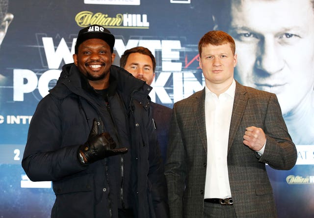 Dillian Whyte, left, and Alexander Povetkin are scheduled to fight again on March 27 in Gibraltar (Martin Rickett/PA)