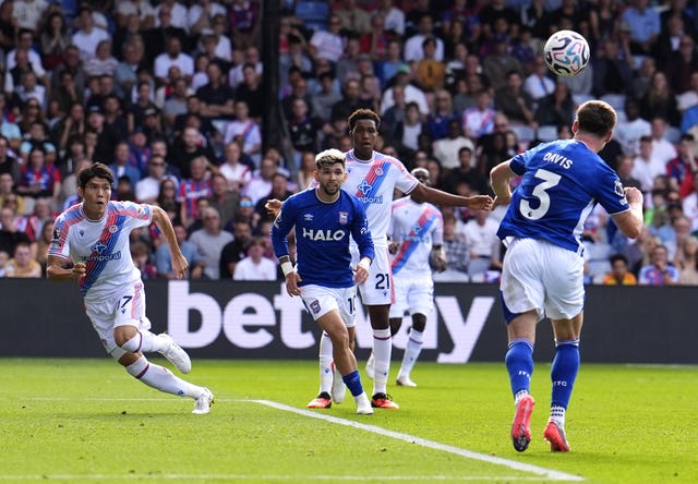 Leif Davis, right, scores Ipswich’s second goal against Crystal Palace