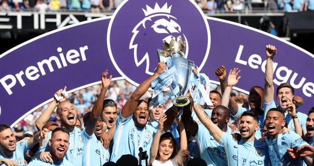 Manchester City lift the Premier League trophy