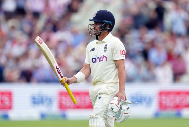 England's Rory Burns walks off the pitch after being dismissed for 81 