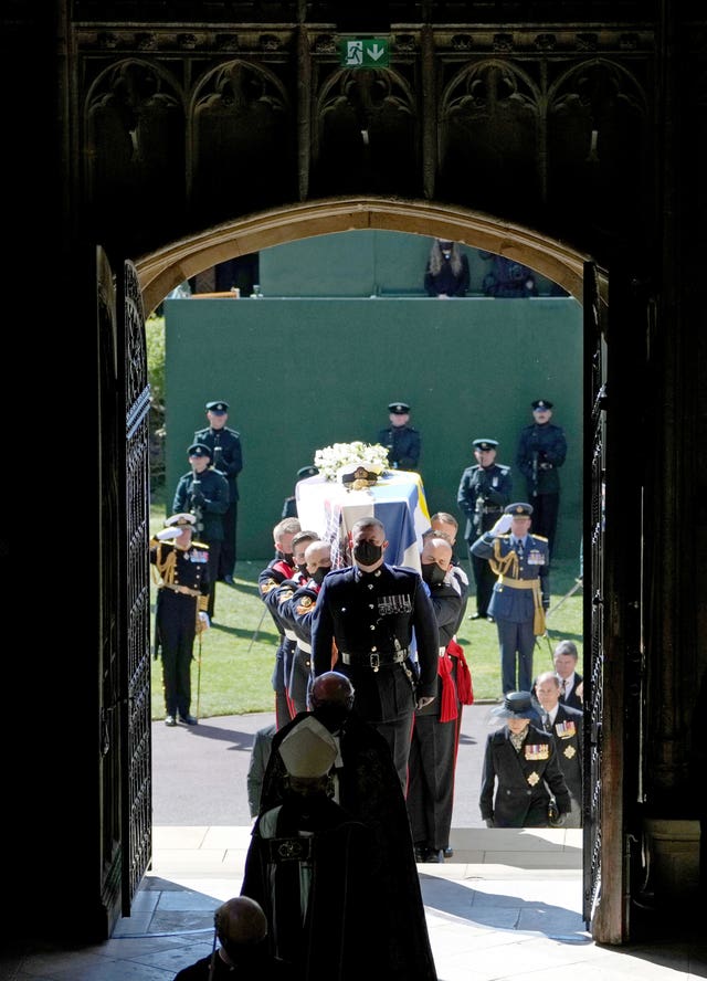 The Duke of Edinburgh’s coffin is carried into his funeral service at St George’s Chapel, Windsor Castle, Berkshire