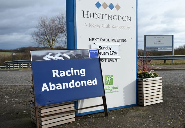 A sign at Huntingdon Racecourse after racing was abandoned because of the equine flu outbreak