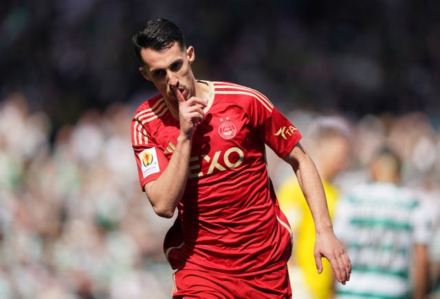 Bojan Miovski puts his finger to his lips after scoring for Aberdeen against Celtic