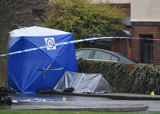 A police forensic tent in Wilson Road, near Pensnett Road, after two men were killed in the early hours of Thursday