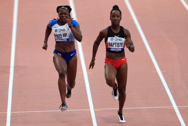 Asha Philip (left) was unable to make it through the 100m heats