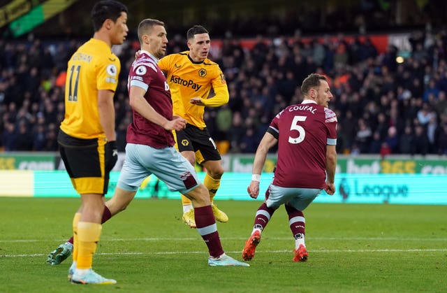 Daniel Podence, centre, scores Wolves' winner