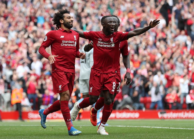 Keita (right) had a hand in Liverpool's opening goal for Mohamed Salah (left)