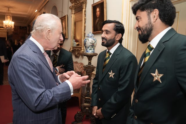 The King meets Ali Usman and members of the Pakistan cricket team