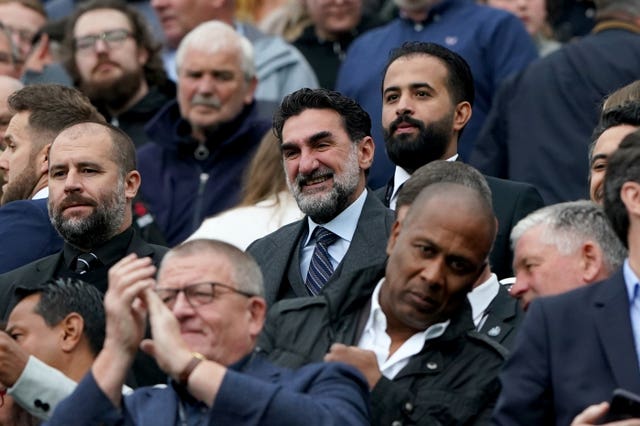 Chairman Yasir Al-Rumayyan, centre, watches Newcastle''s win over Tottenham