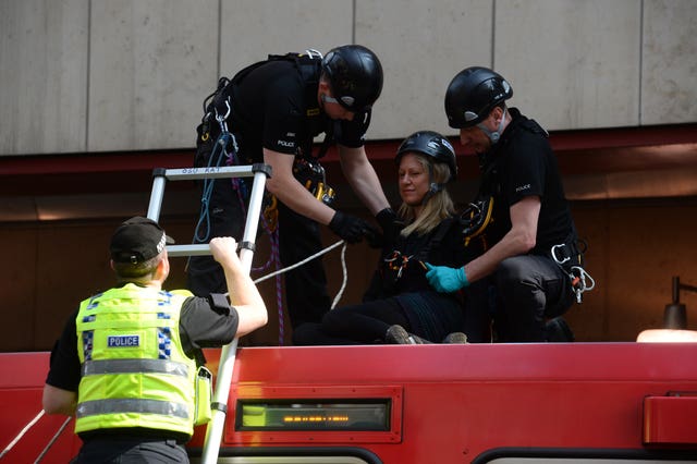 The activists were removed from the train after almost two hours (Kirsty O’Connor/PA)