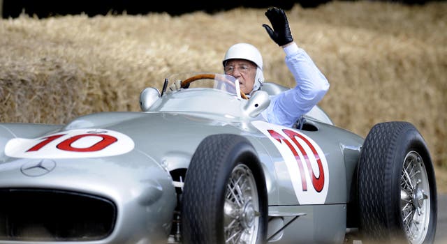 Stirling Moss driving an old Mercedes during the Goodwood Festival of Speed 