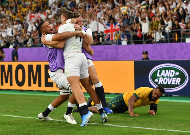 Jonny May celebrates his second try with England replacements Lewis Ludlam and George Ford 