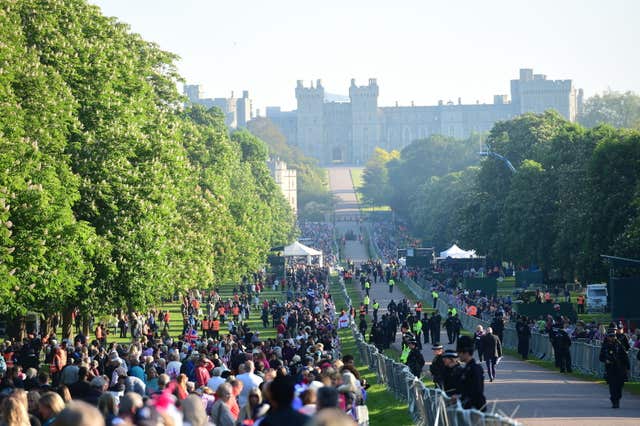 Crowd fever: Spectators arrive on the Long Walk in the Windsor (David Mirzoeff/PA)