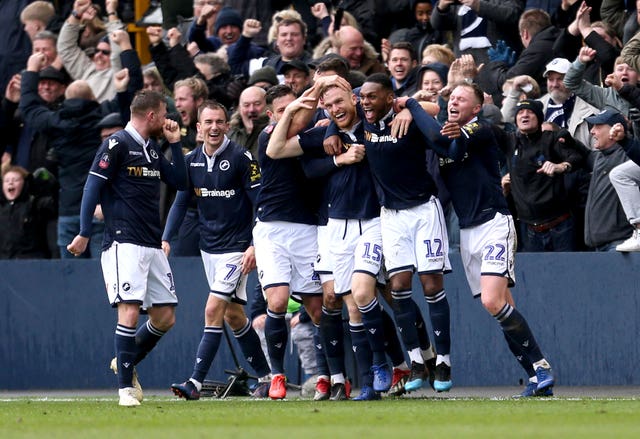 Alex Pearce headed Millwall in front during their FA Cup quarter-final against Brighton.